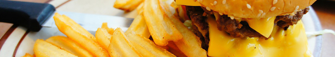 Eating Burger at Burger Tavern 77 restaurant in Columbia, SC.